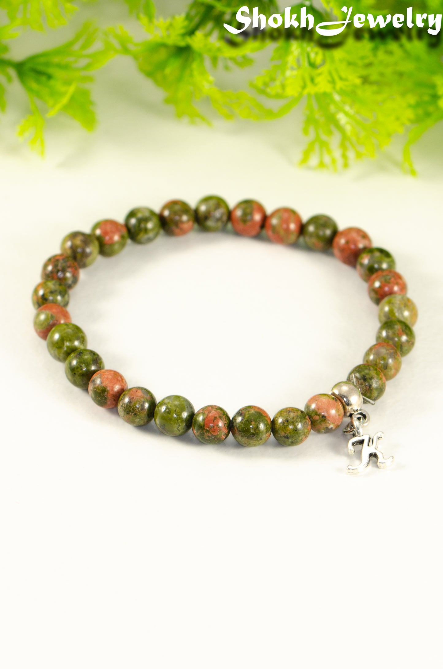 Close up of 6mm Unakite Bracelet with Initial.