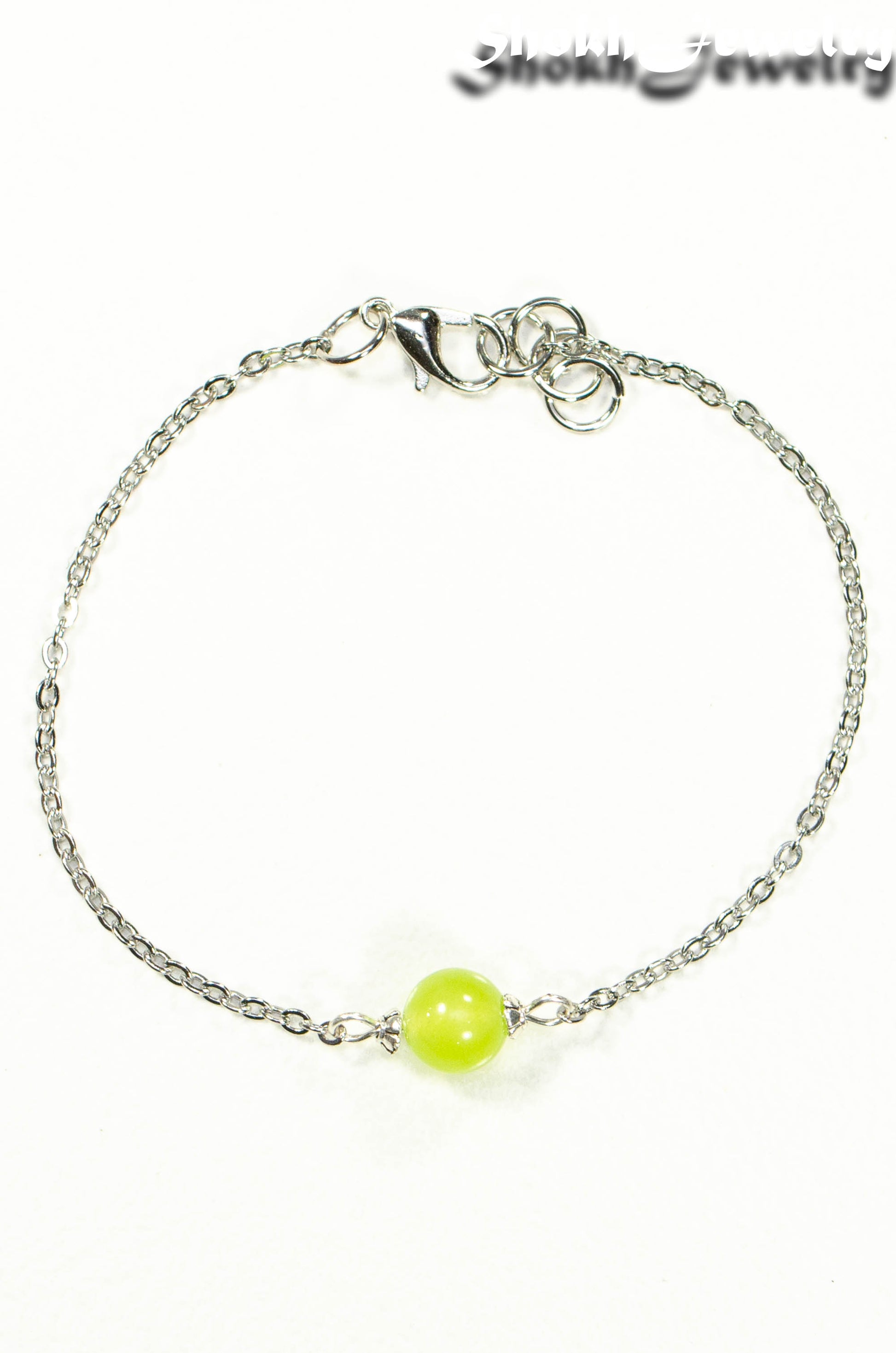 Top view of 8mm Peridot and Chain Anklet.