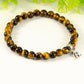 Close up of 6mm Tiger's Eye Bracelet with Initial.