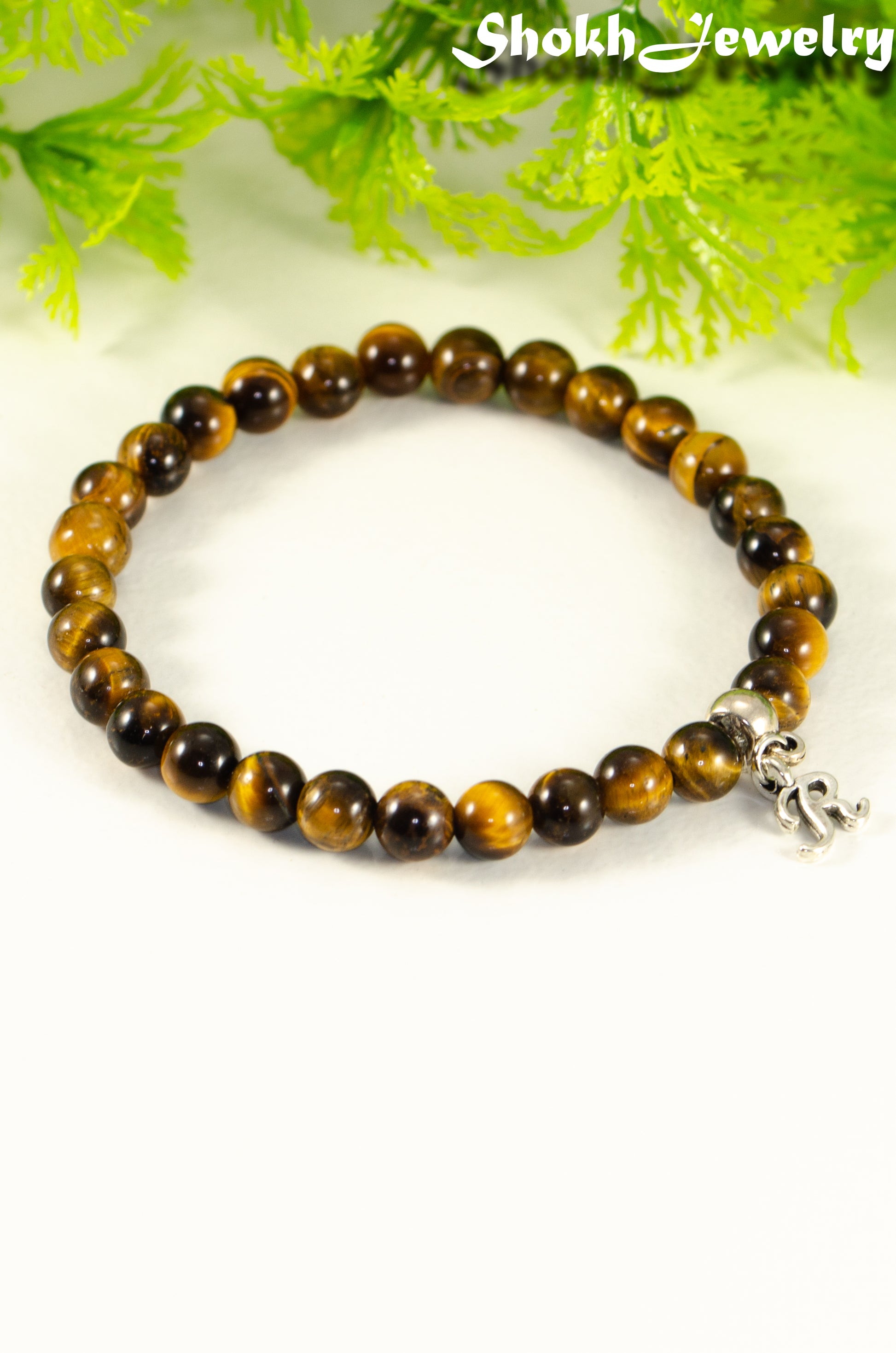 Close up of 6mm Tiger's Eye Bracelet with Initial.