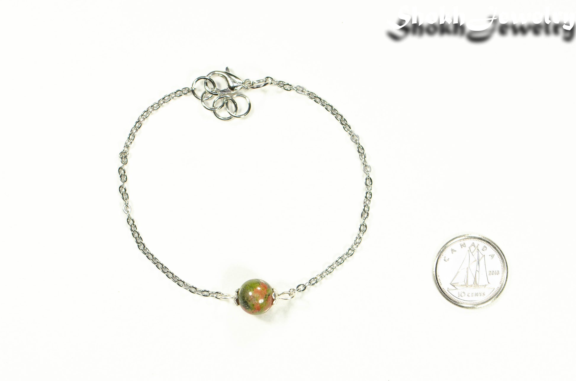 8mm Unakite Jasper and Chain Anklet beside a dime.