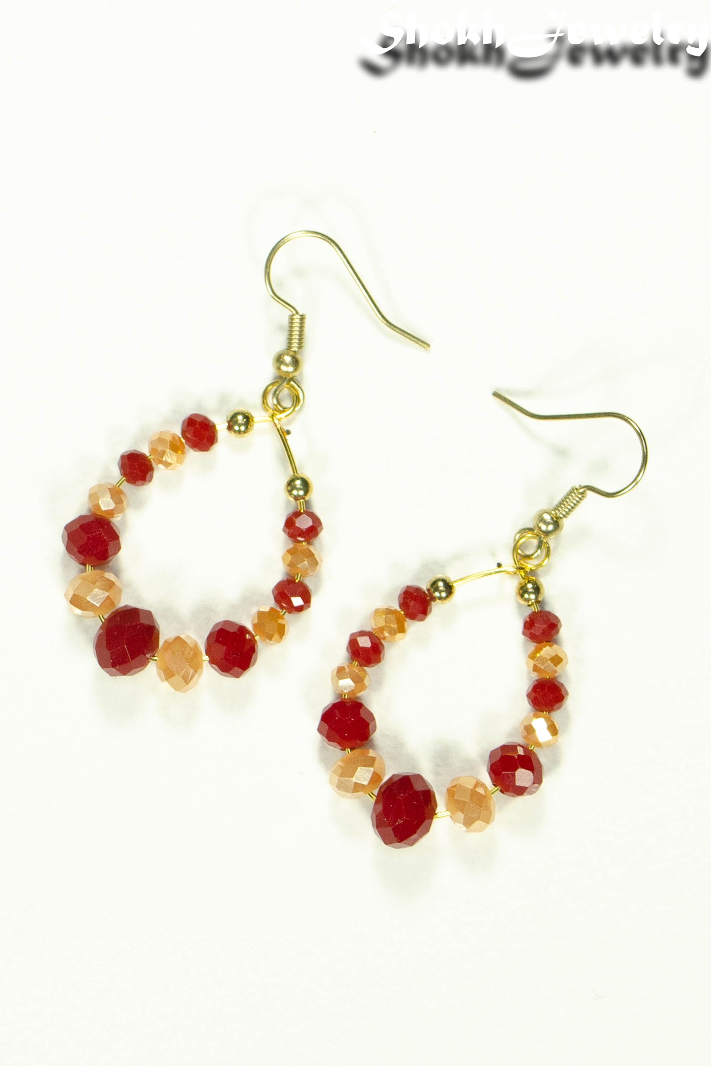 Top view of Red and Gold Glass Crystal Hoop Earrings.