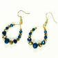 Top view of Blue and Gold Glass Crystal Hoop Earrings.