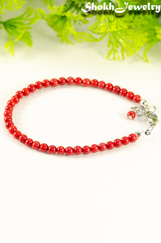 Close up of 4mm Natural Red Coral anklet with Clasp.