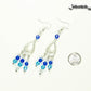 Ombre Blue Glass Crystal Chandelier Earrings beside a dime.