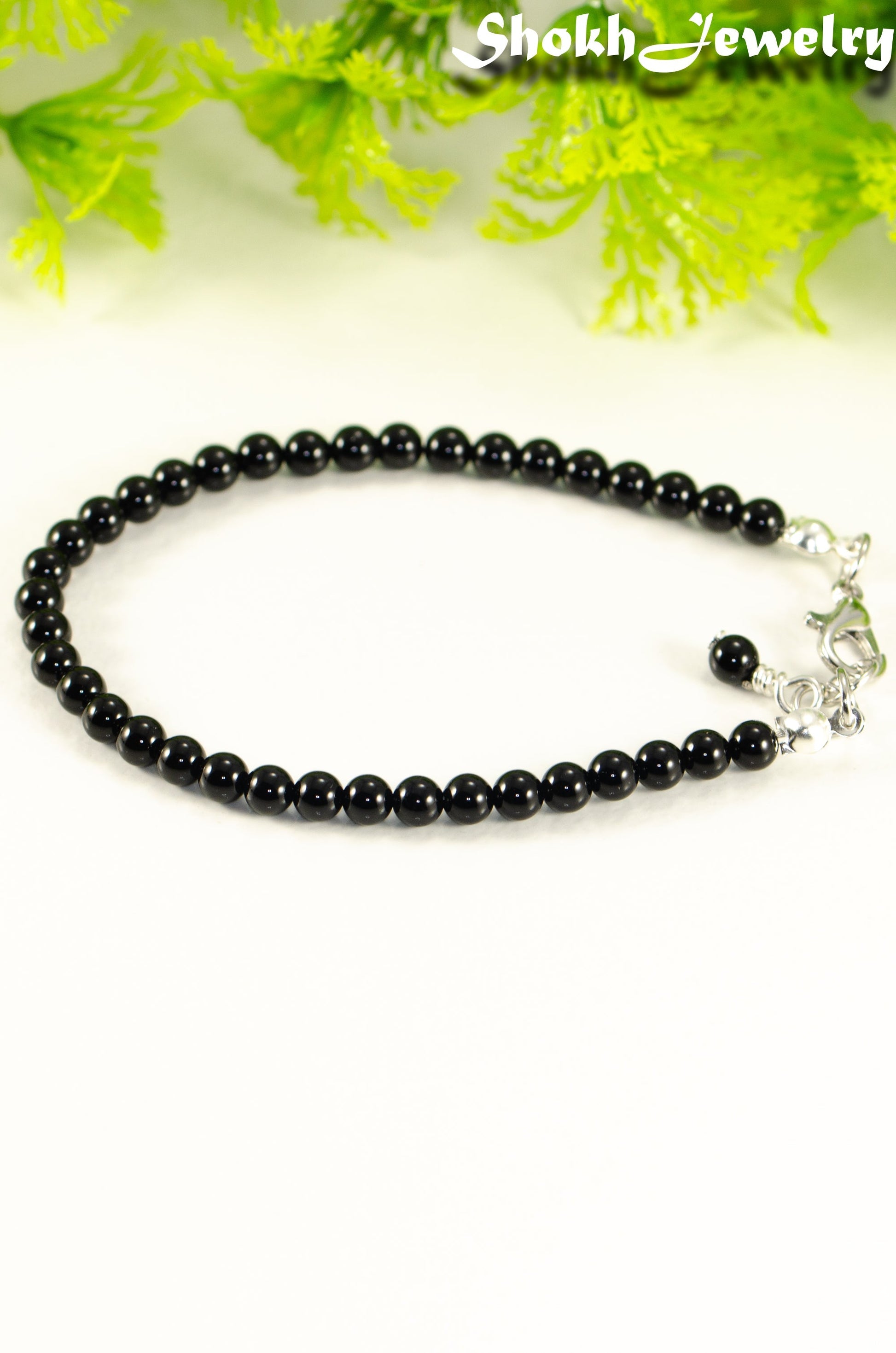 Close up of 4mm Black Obsidian Crystal anklet with Clasp.