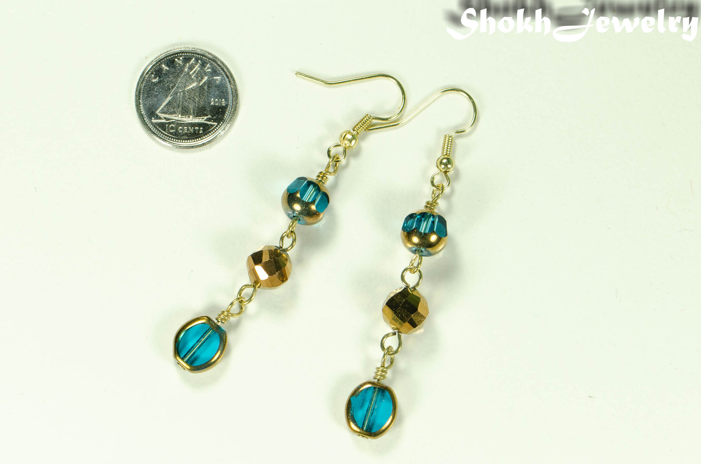 Gold and Patina Blue Glass Bead Dangle Earrings