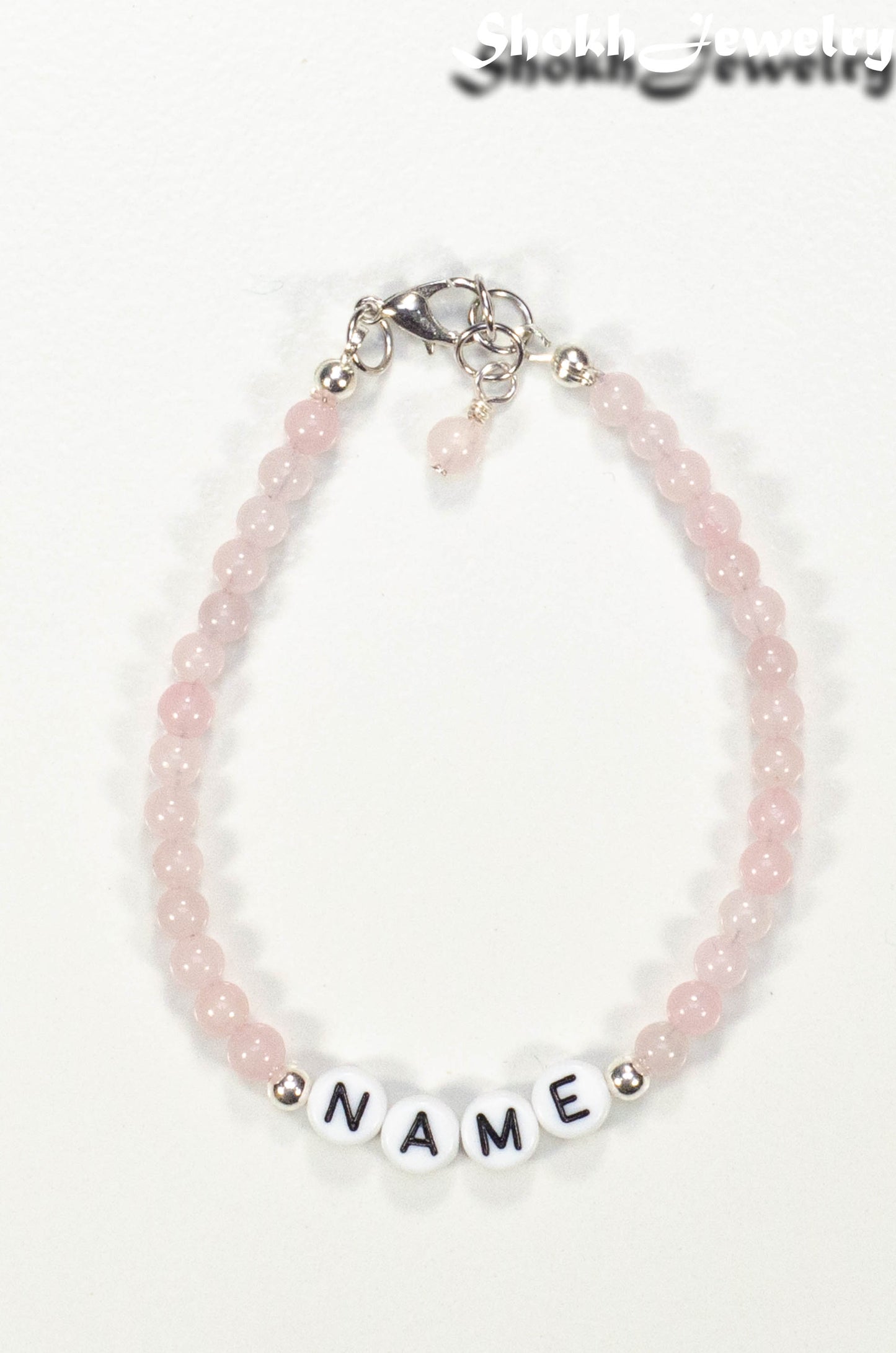 Top view of Personalized Rose Quartz Name Bracelet with Clasp.