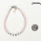 Personalized Rose Quartz Name Bracelet with Clasp beside a dime.