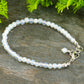 Close up of 4mm White Opal anklet with Clasp.