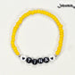 Top view of Yellow Seed Beads Name Bracelet.