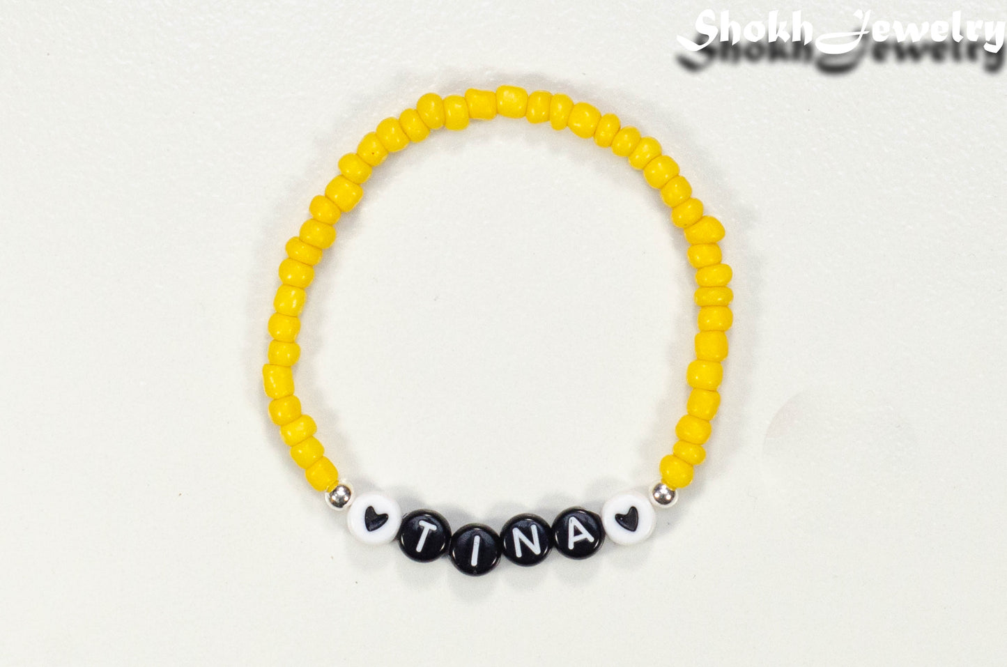 Top view of Yellow Seed Beads Name Bracelet.