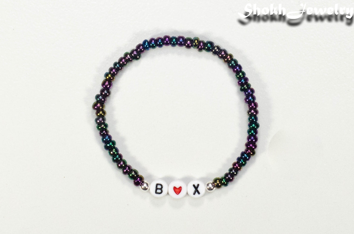 Top view of Metallic Black Seed Beads Bracelet with Initials.