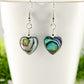 Close up of Heart Shaped Abalone Shell Earrings.