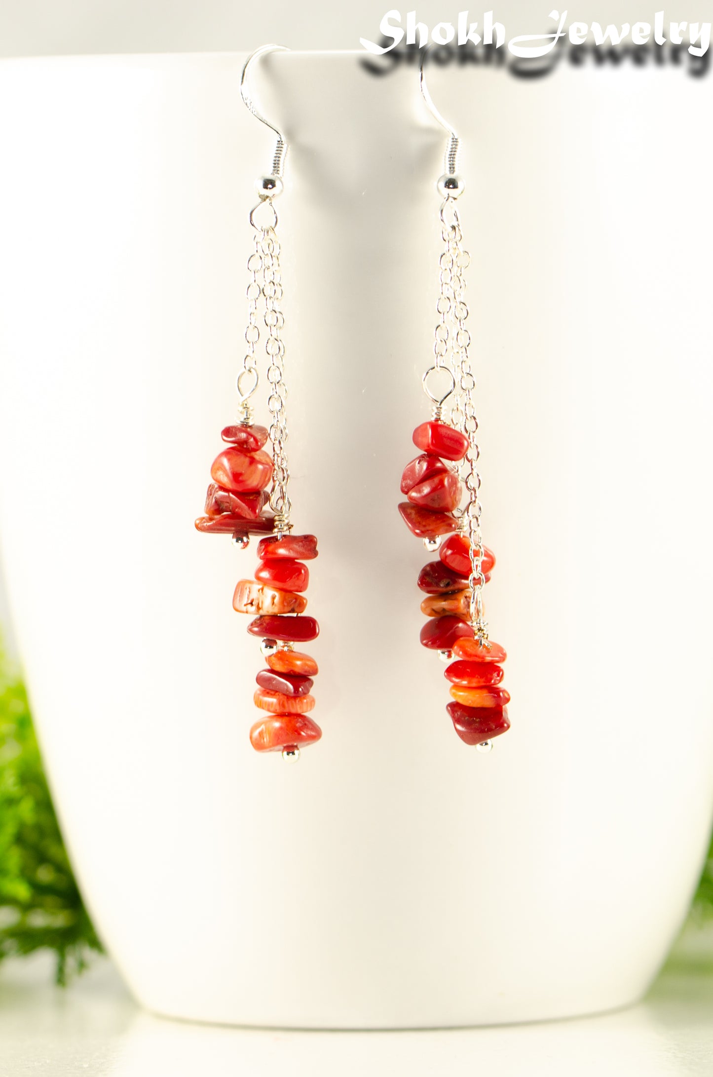 Close up of Long Silver Plated Chain and Red Coral Chip Earrings.
