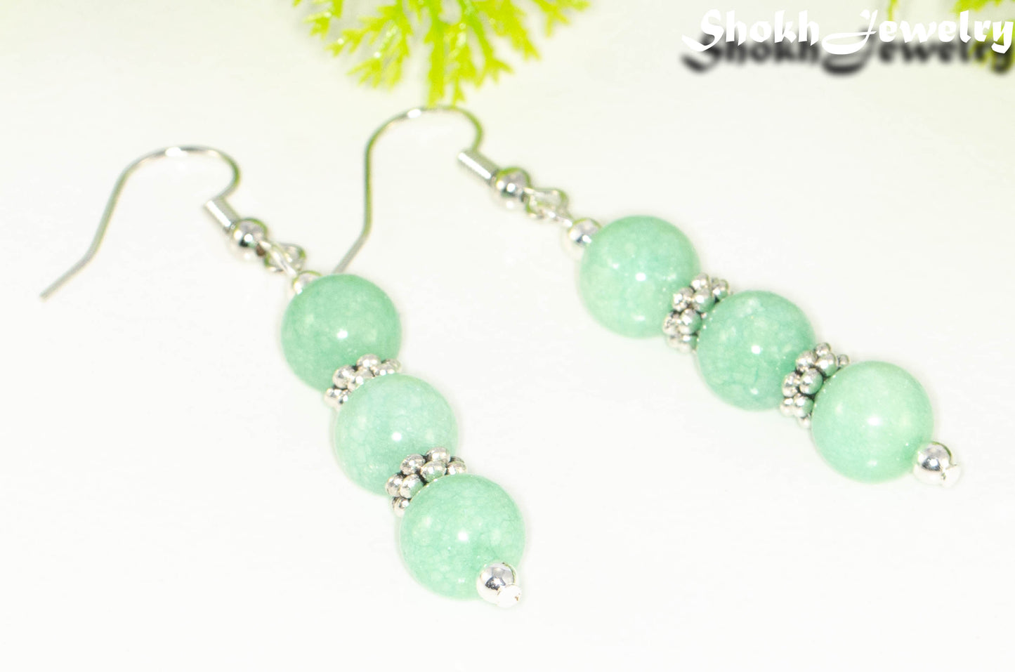 Close up of Natural Mint Green Quartz Beaded Bar Earrings.