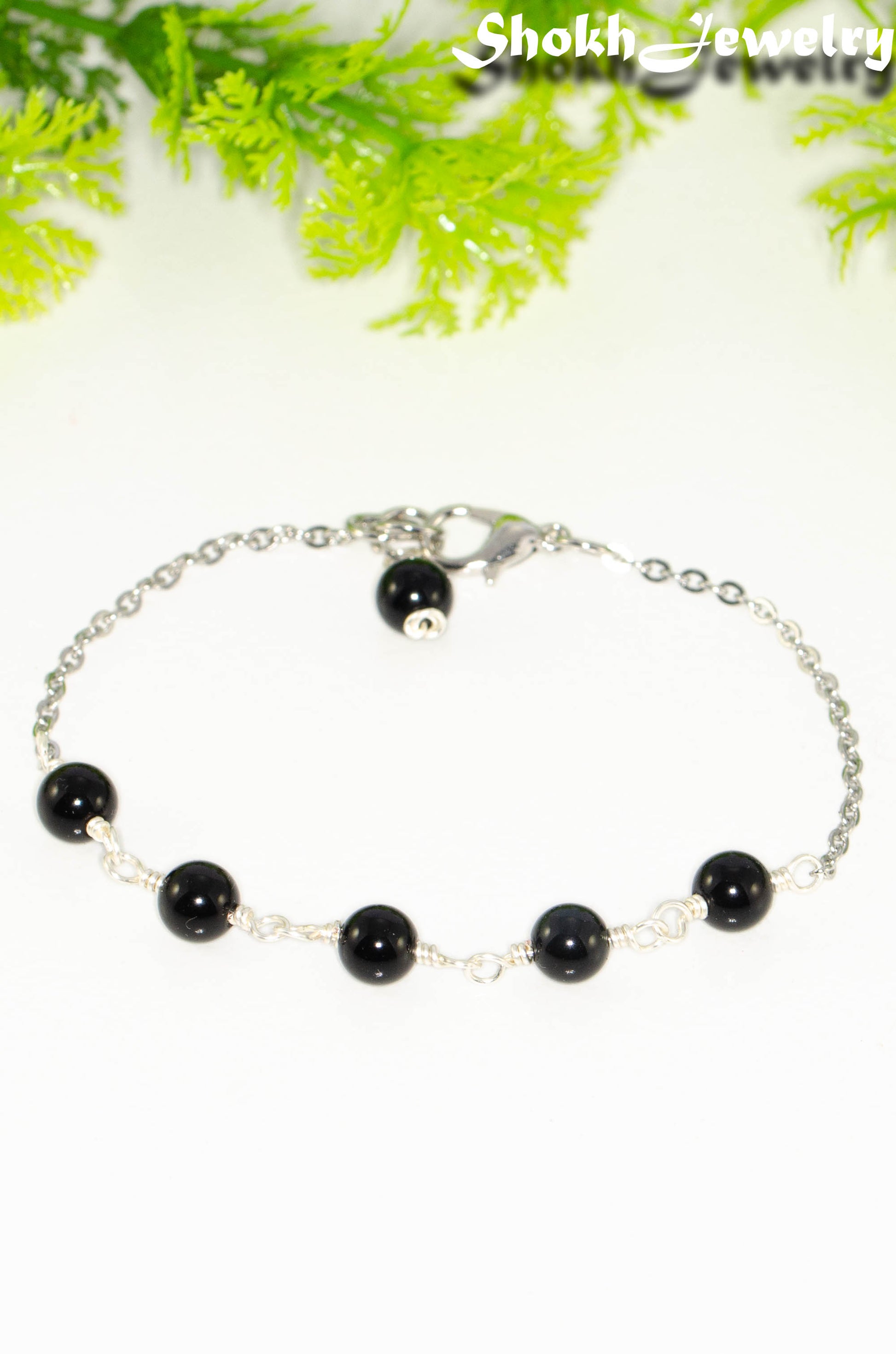 Black Obsidian and Stainless Steel Chain bracelet for women.