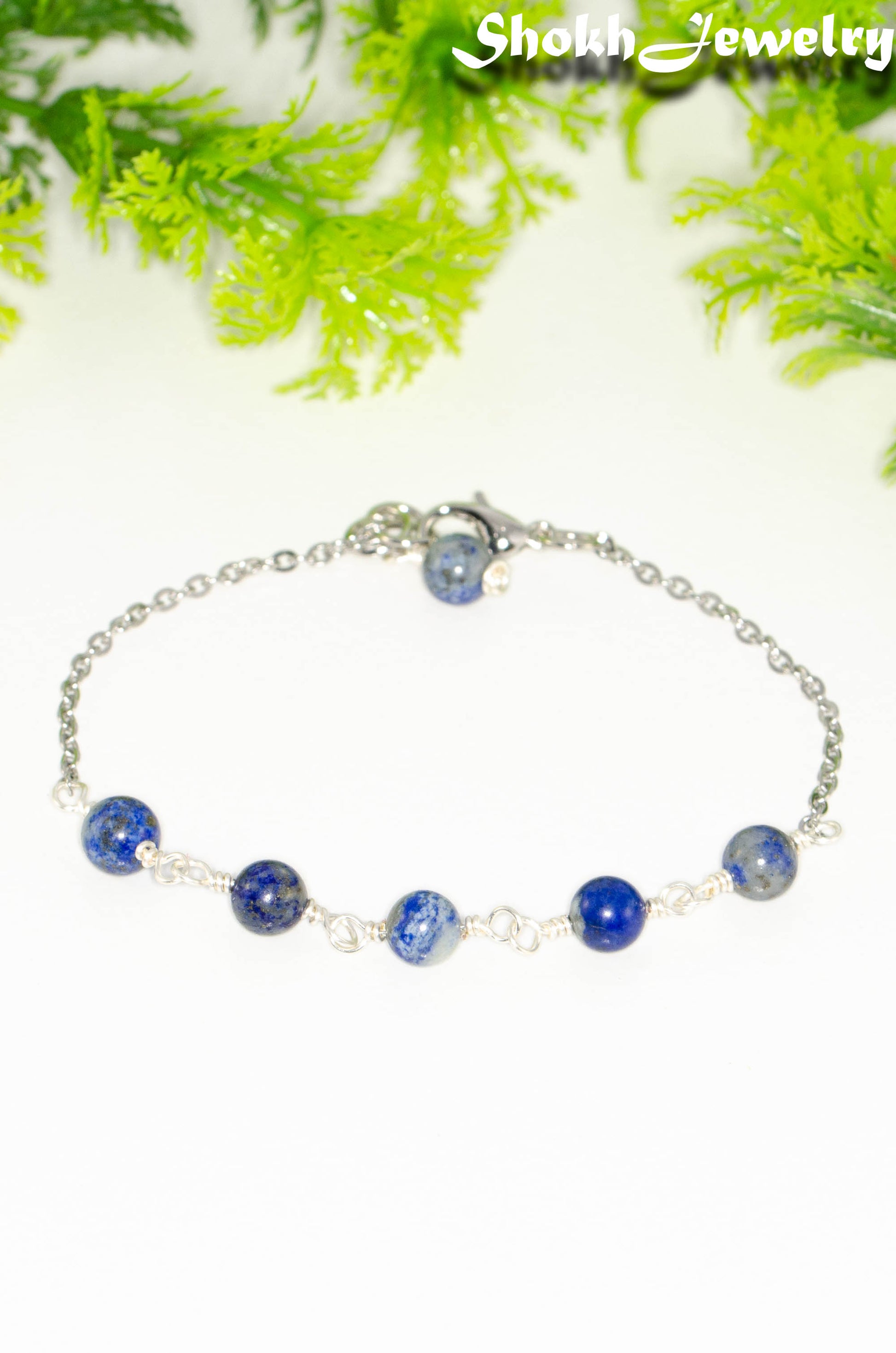 Close up of Lapis Lazuli and Stainless Steel Chain Bracelet.