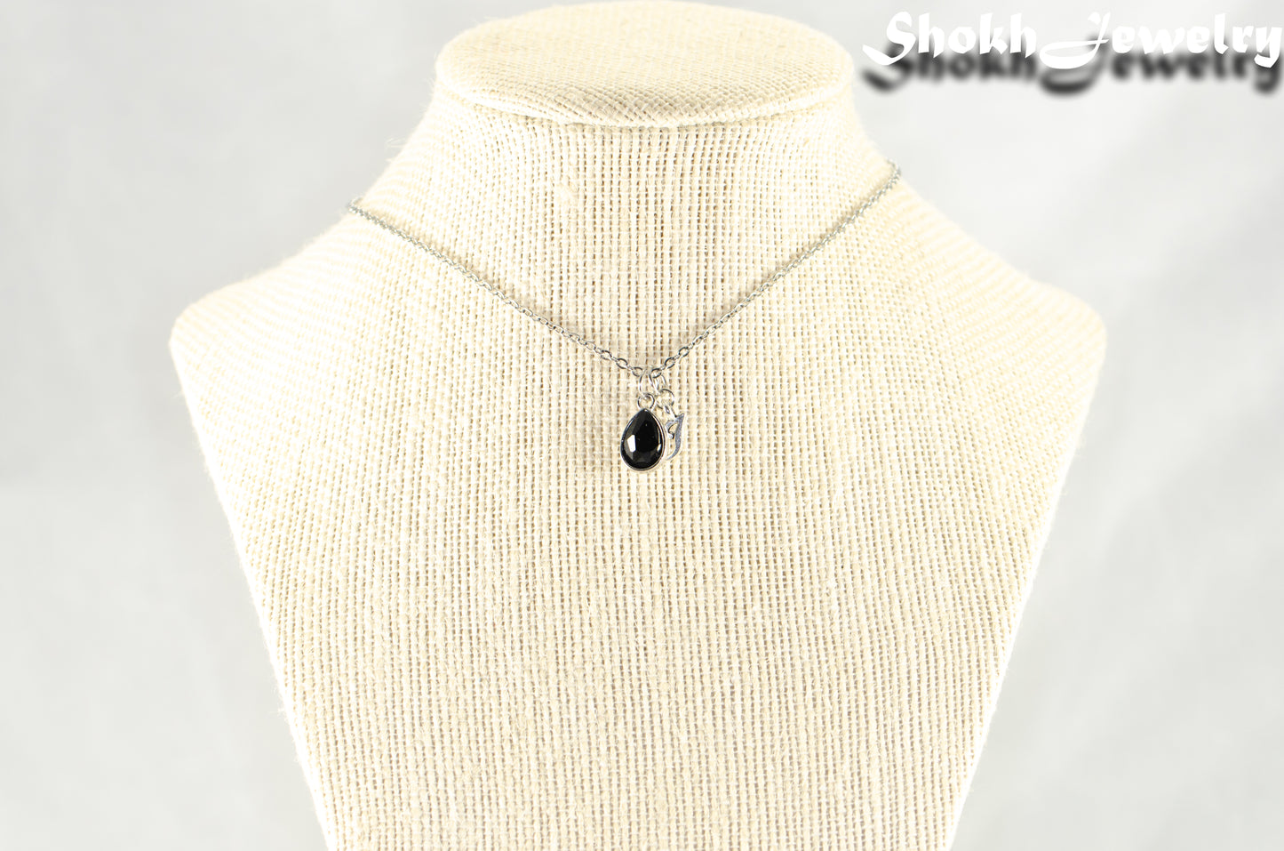 Small Personalized October Birthstone Choker Necklace desplayed on a bust.