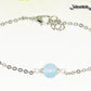 Close up of 8mm Aquamarine and Chain Anklet.