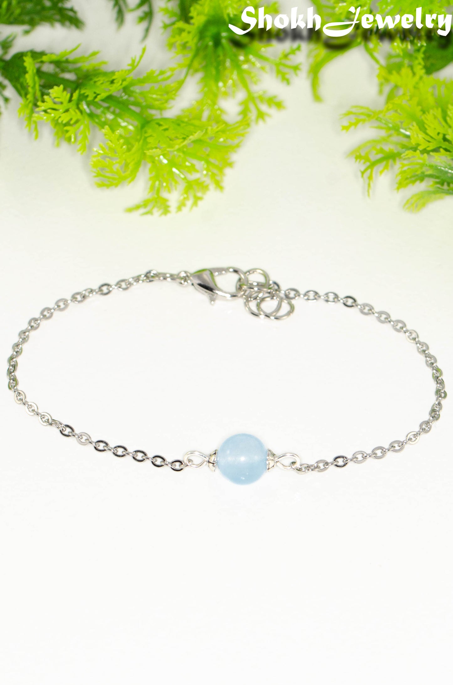 Close up of 8mm Aquamarine and Chain Anklet.