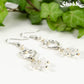Close up of Silver Plated Heart and Clear Glass Crystal Cluster Earrings.