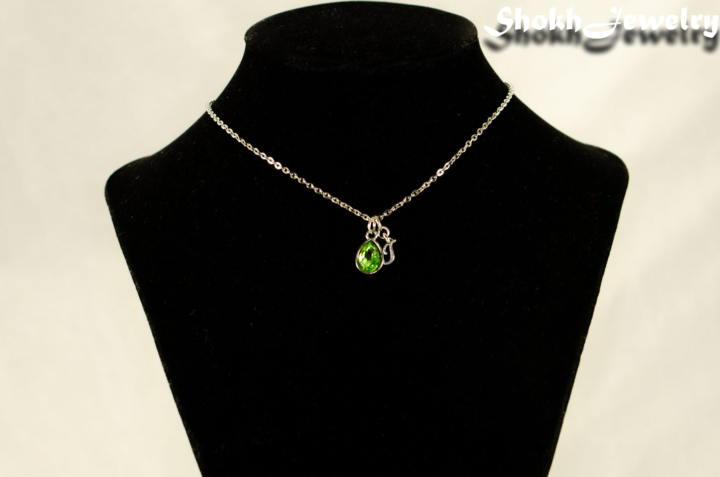 Small Personalized August Birthstone Choker Necklace displayed on a bust.