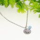 March Birth Flower Necklace with Aquamarine Birthstone Pendant.