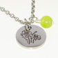 Close up of August Birth Flower Necklace with Peridot Birthstone Pendant