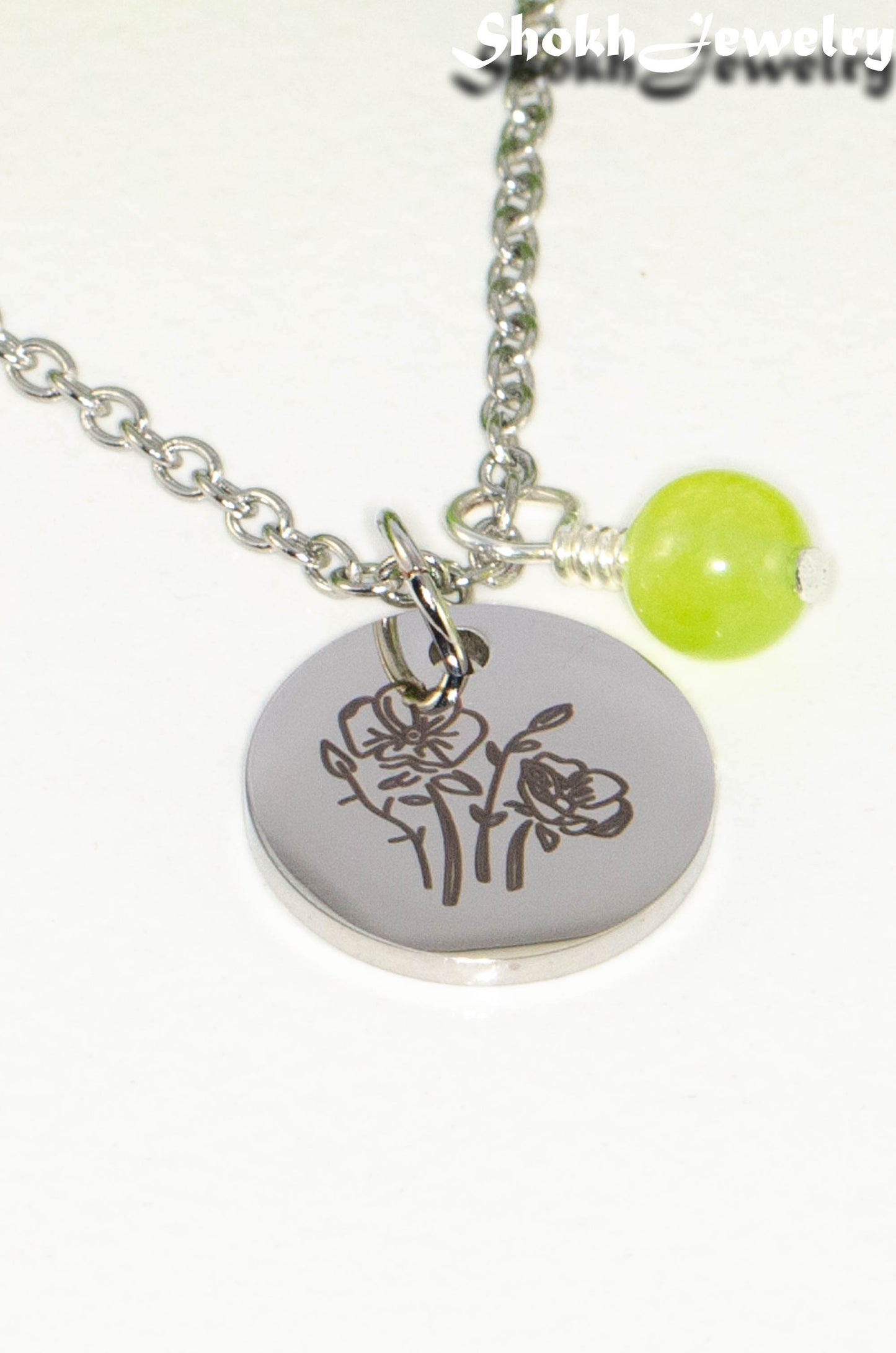 Close up of August Birth Flower Necklace with Peridot Birthstone Pendant