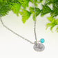 December Birth Flower Necklace with Turquoise Howlite Birthstone Pendant.