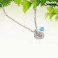 December Birth Flower Necklace with Turquoise Howlite Birthstone Pendant.