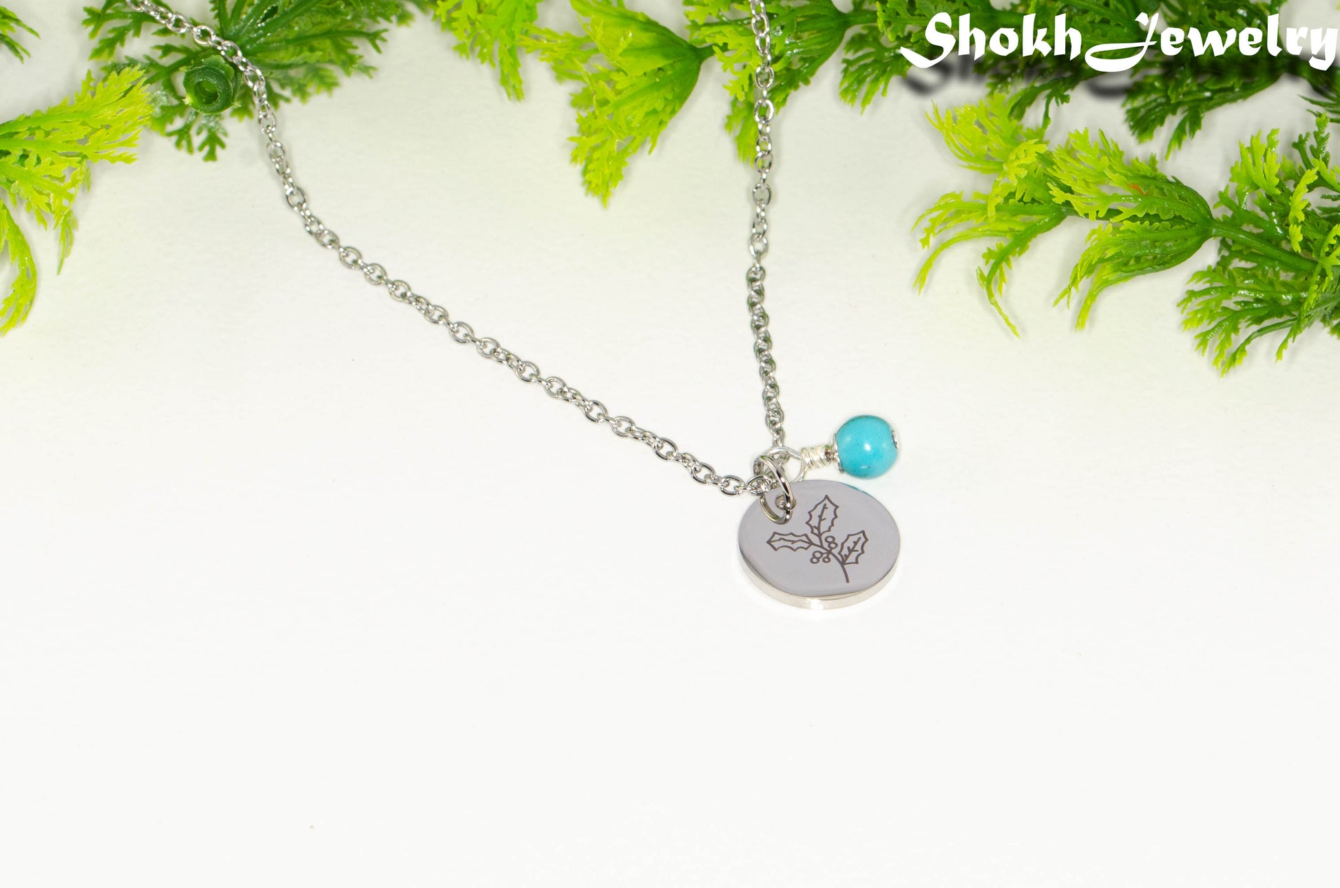 December Birth Flower Necklace with Turquoise Howlite Birthstone Pendant.