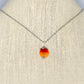 12mm Carnelian Pendant Necklace displayed on a bust.