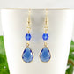 Close up of Blue Glass Teardrop Dangle Earrings.