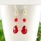 Close up of Red Glass Teardrop Dangle Earrings.