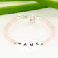 Close up of Personalized Rose Quartz Name Bracelet with Clasp.