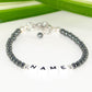 Close up of Personalized Hematite Stone Name Bracelet with Clasp.