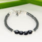 Close up of Personalized Hematite Stone Bracelet with Clasp.