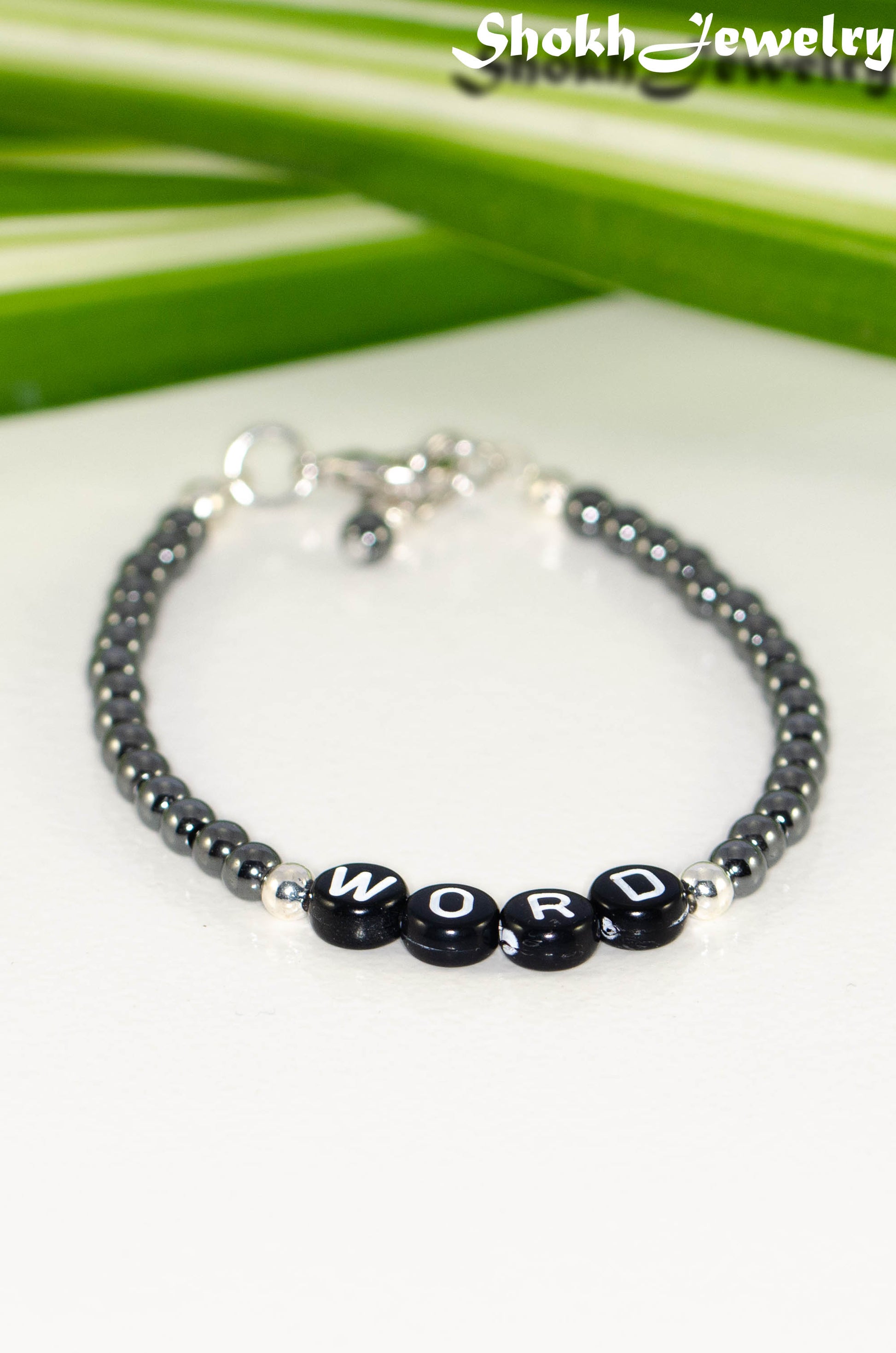 Close up of Personalized Hematite Stone Bracelet with Clasp.