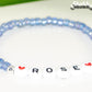 Close up of Blue Seed Beads Name Bracelet.