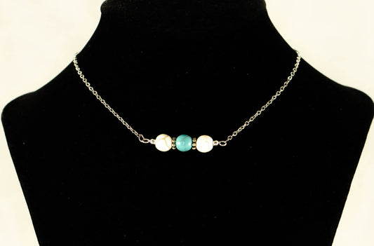 White and Turquoise Howlite and Dainty Chain Choker Necklace displayed on a bust.