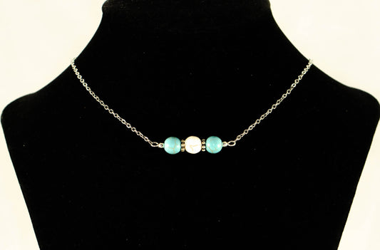 Turquoise and White Howlite and Dainty Chain Choker Necklace displayed on a bust.