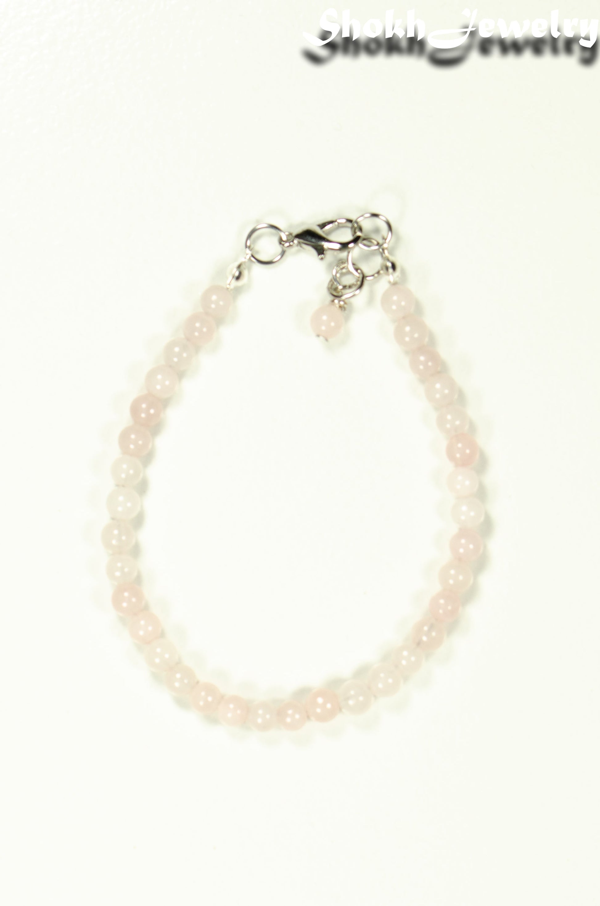 Close up of 4mm Rose Quartz anklet with Clasp.