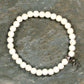 Top view of 6mm White Howlite Bracelet with Initial.