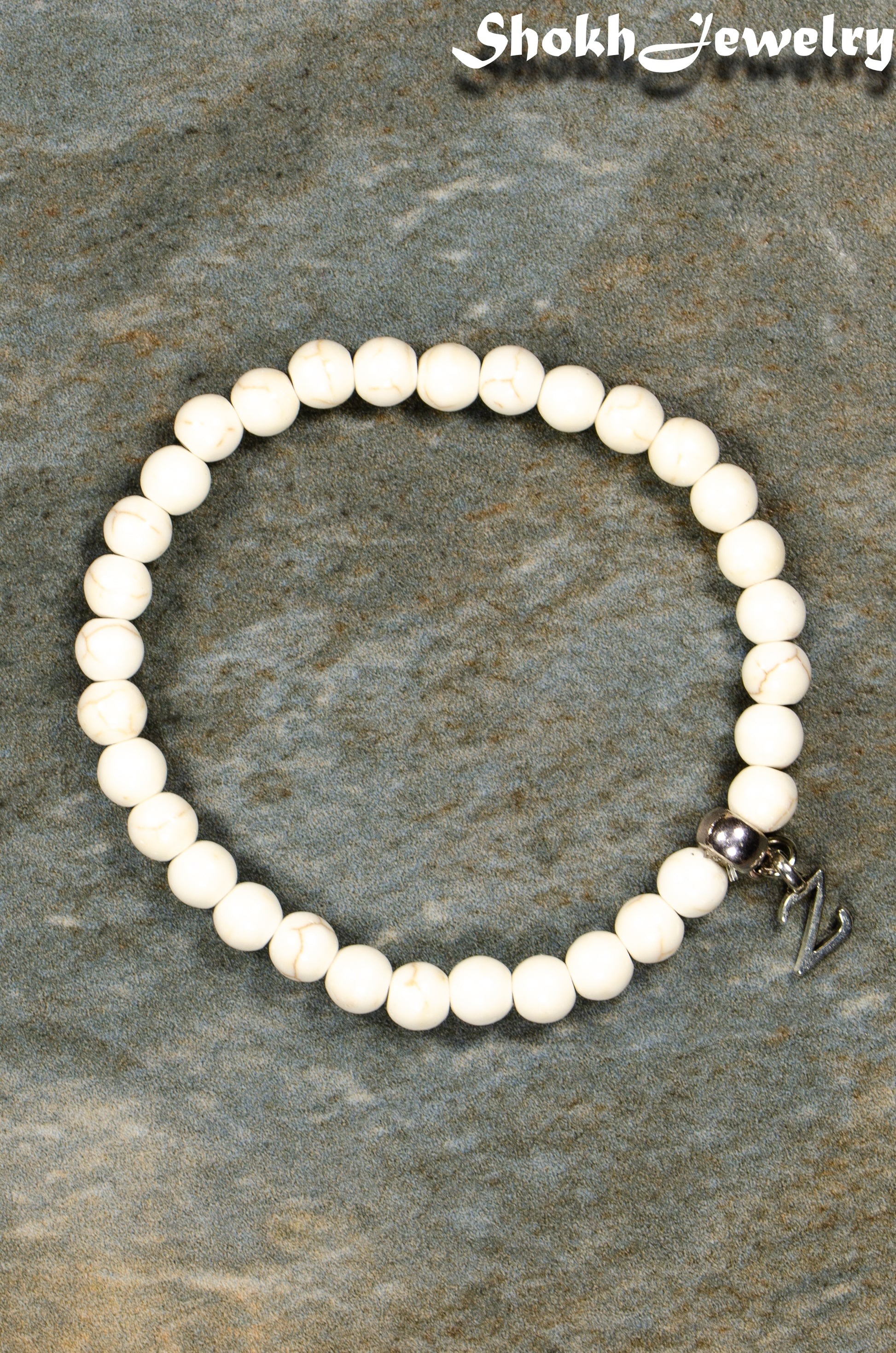 Top view of 6mm White Howlite Bracelet with Initial.