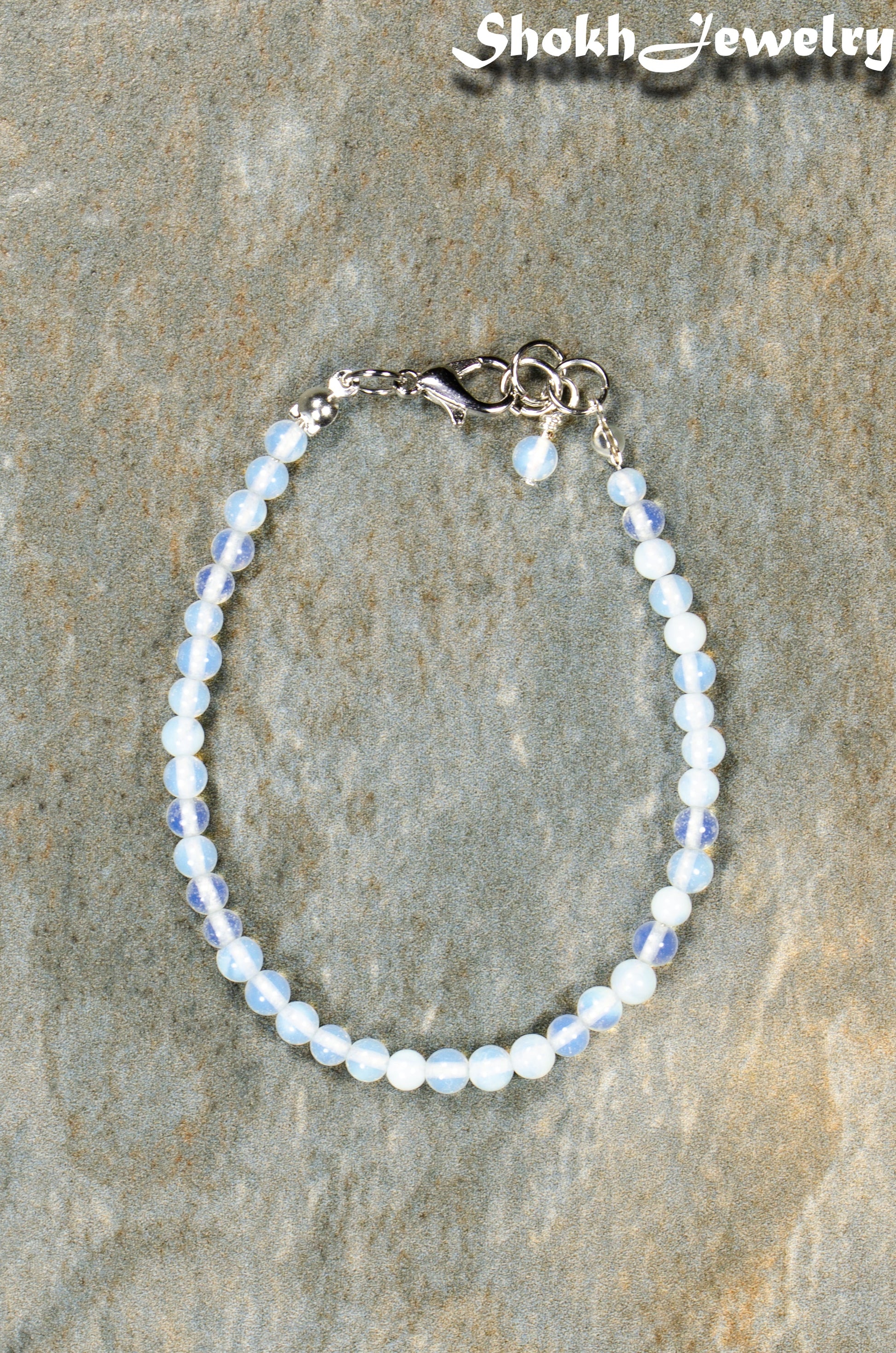 Top view of 4mm White Opal anklet with Clasp.