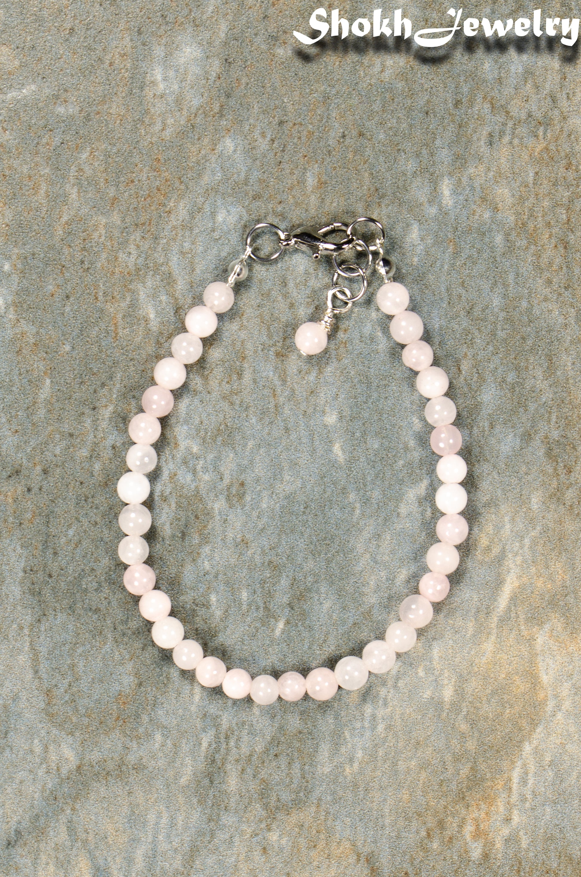 Top view of 4mm Rose Quartz Bracelet with Clasp.