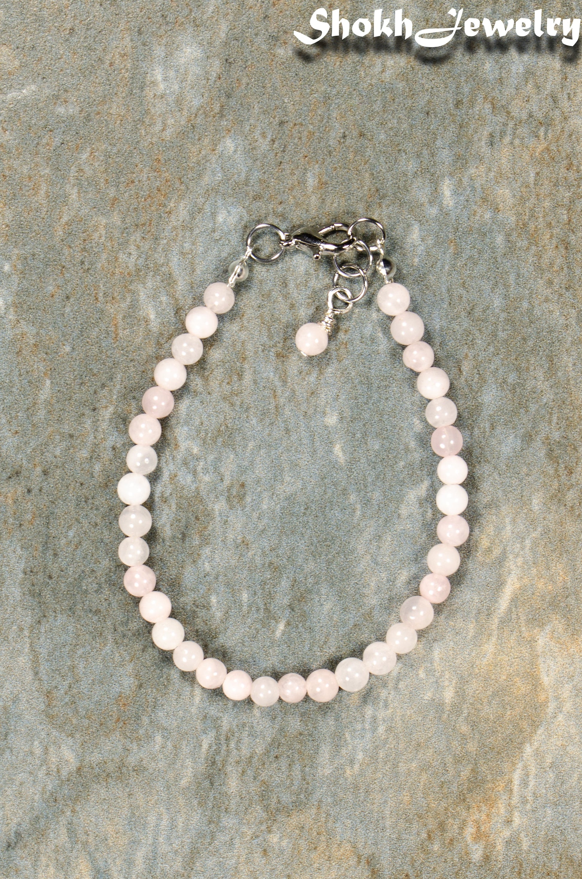 Top view of 4mm Rose Quartz anklet with Clasp.