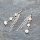 Top view of Long Chain and Freshwater Pearls Earrings.